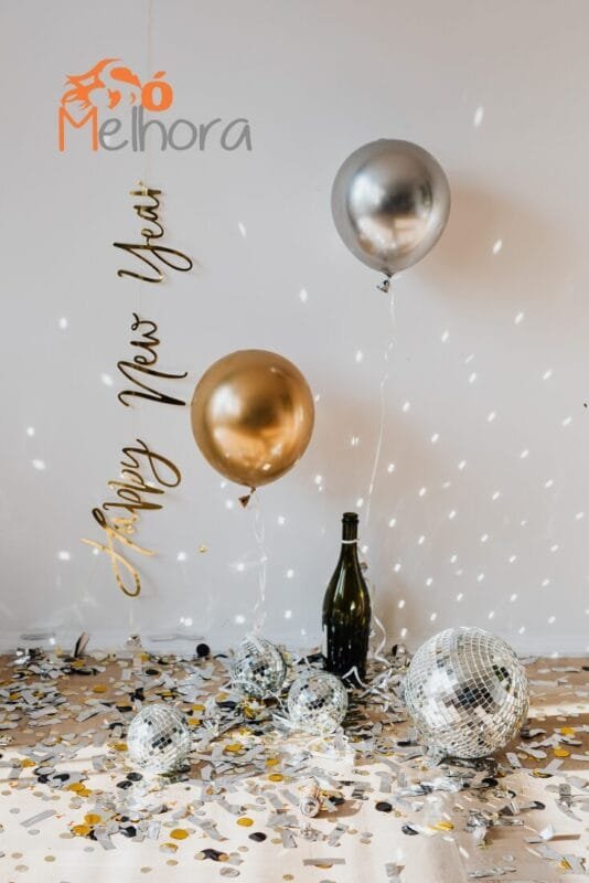 Imagem com balões, confetes e espumante